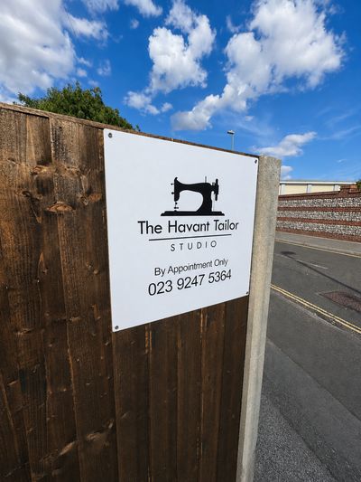 The Havant Tailor Studio sign at the roadside entrance